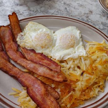 Angie's Restaurant - Bacon, hash browns and eggs. The toast is in upper right corner. - Breakfast & Brunch Near Me - Logan, Utah