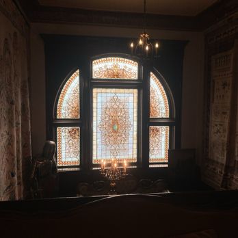 Henderson Castle - A stained glass window near the stairs - Day Spas Near Me - Kalamazoo, Michigan