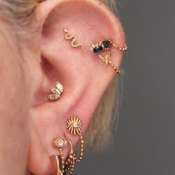 Ahimsa Piercing Studio & BVLA Fine Jewelry - Rose Gold and London Blue Topaz Ear Curation
