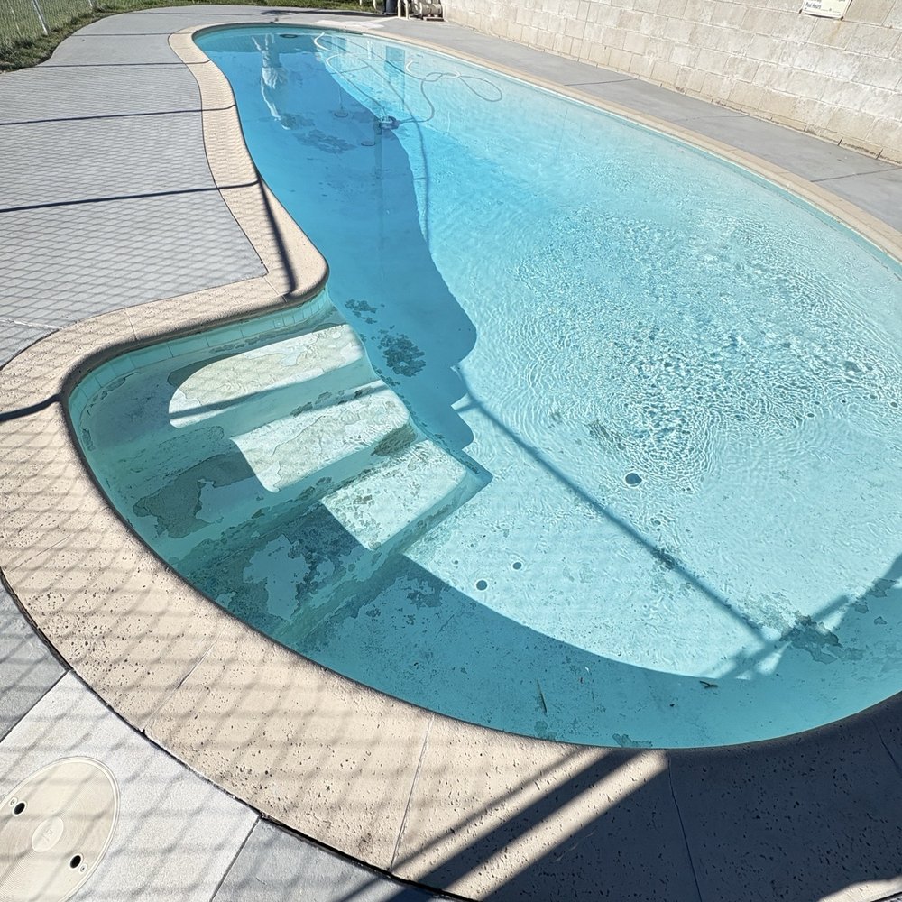 Blue Whale Pools - This is the before look with no hand rail, wrong size pool filter and light fixture that was broken. - Pool & Hot Tub Service Near Me - Ontario, California