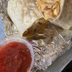 Georges Burgers - Breakfast burrito - bacon, homestyle potatoes, cheese, and eggs with a side of salsa