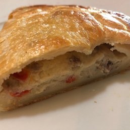 Sausage "empanada." Beautiful, buttery, flakey pastry. Sausage "empanada." Beautiful, buttery, flakey pastry.