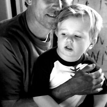 JC Rose Farms - a black and white photo of a man holding a child - Farmers Market Near Me - Moyock, North Carolina JC Rose Farms - a black and white photo of a man holding a child - Farmers Market Near Me - Moyock, North Carolina