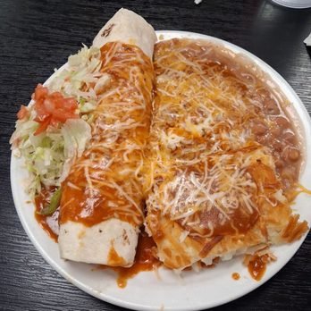 Weck's - Weck's lunch burrito plate. A bit disappointing. They should not have covered the hash browns with that poor red sauce! The beans were ok. - Breakfast & Brunch Near Me - Las Cruces, New Mexico