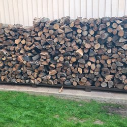 Celia's Firewood - Almost the full cord in this photo, I have a separate smaller rack holding another 4' x 5' amount.