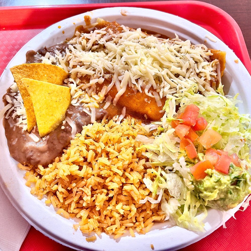 Pineda Tacos - Chipotle Chicken & Mexican Steak Enchiladas Rancheras with Rice, Guacamole, Iceberg Lettuce, and Refried Beans, topped with Shredded Cheese - Mexican Near Me - Plymouth, Minnesota Pineda Tacos - Chipotle Chicken & Mexican Steak Enchiladas Rancheras with Rice, Guacamole, Iceberg Lettuce, and Refried Beans, topped with Shredded Cheese - Mexican Near Me - Plymouth, Minnesota