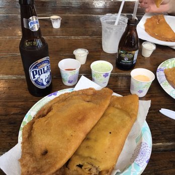 Parguito Gourmet - two plates of food and a bottle of beer - Venezuelan Near Me - Hollywood, Florida Parguito Gourmet - two plates of food and a bottle of beer - Venezuelan Near Me - Hollywood, Florida