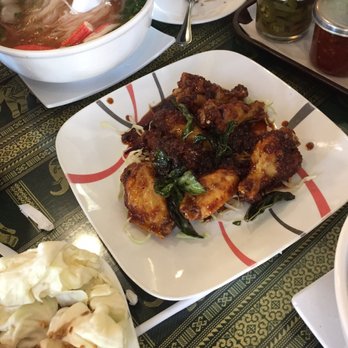 Thai Cuisine II - Hot wings in sweet/sour garlic sauce. These wings are sticky so if it gets on your clothes there will be a stain! - Thai Near Me - Merced, California
