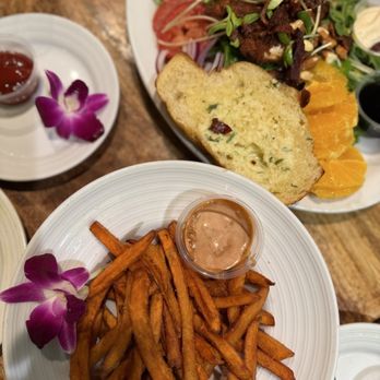 Island Vintage Wine Bar - Sweet potato fries Orange and chicken salad - Wine Bars Near Me - Honolulu, Hawaii Island Vintage Wine Bar - Sweet potato fries Orange and chicken salad - Wine Bars Near Me - Honolulu, Hawaii