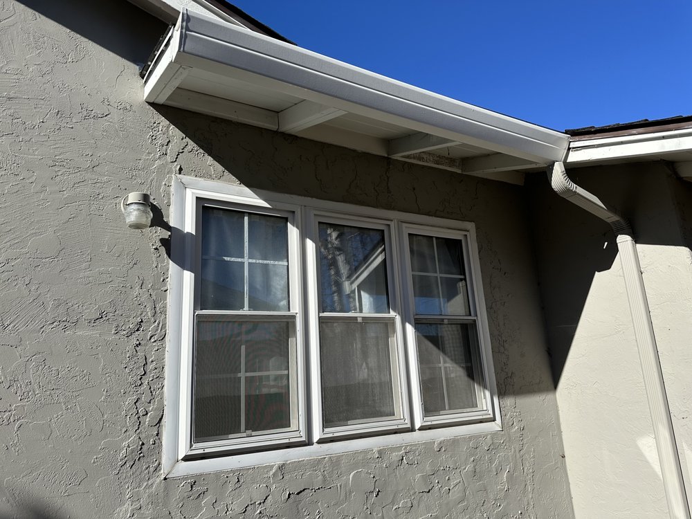 Slide of Umbrella Plastering & Roofing