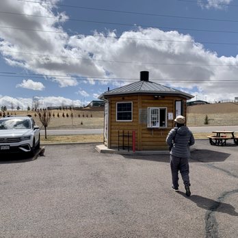 Destination Taiwan - a man standing in a parking lot - Bubble Tea Near Me - Cheyenne, Wyoming
