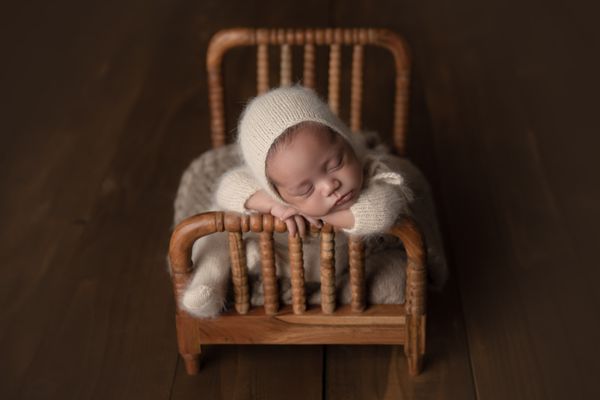 Newborn Photography - Capture the first weeks of your newborn's life with heirloom quality photos.