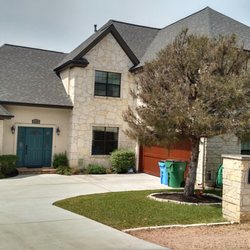 Starr Roofing & Gutters - Inspecting a 2 story laminated roof for replacement.