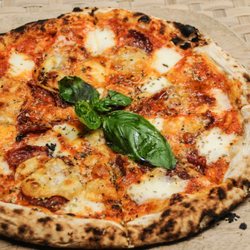 Kermit Surf Resort and Restaurant - Some say the best pizza in Asia. Source: https://www.kermitsiargao.com/
