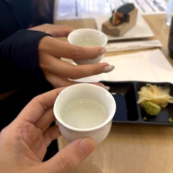 The Bar - Hand Rolls by Seabutter - shot of hot sake - Sushi Bars Near Me - Los Angeles, California