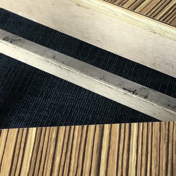 Buffalo Wild Wings - a pair of scissors on a table - American Near Me - DeKalb, Illinois