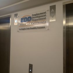 EDD Disability Insurance Office - EDD signage above the elevator as you prepare to head back to the lobby.