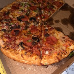 MrJims.Pizza - Sheridan - D'lish Supreme. Extra sauce. Waited a while to take the picture. Garlic and Parmesan crust.