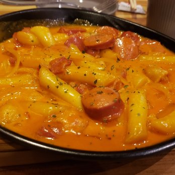 The Fry - Rosé sauce rice cake. With glass noodle, bacon, ham, onion, and smoky sausage. So good! - Chicken Shop Near Me - Scarborough, Ontario