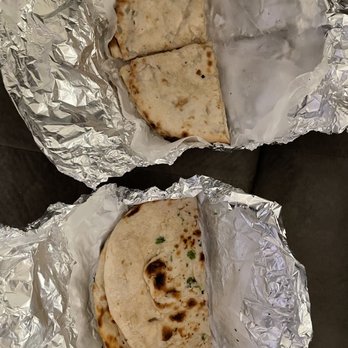 Curry Leaf - two quesadillas wrapped in foil - Indian Near Me - Grand Rapids, Michigan