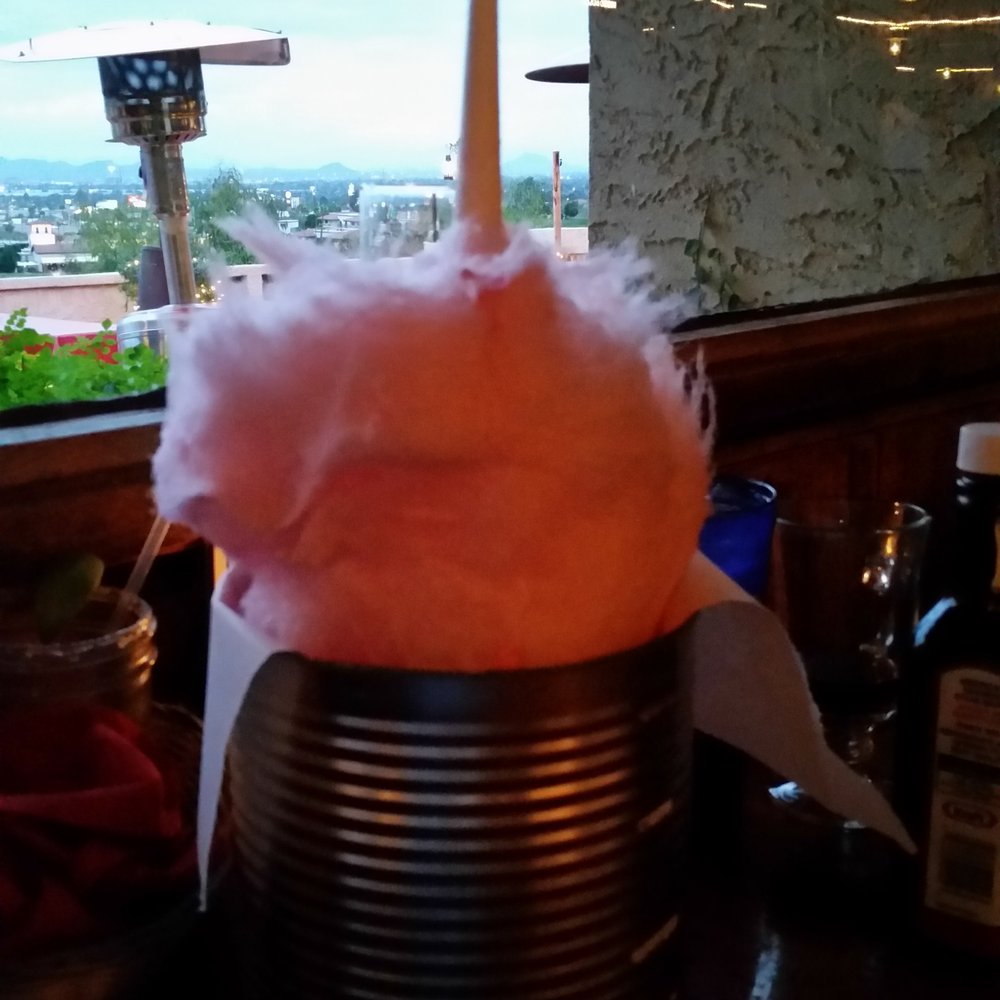 Rustler's Rooste - Cotton Candy served after the meal... Not sticky at all like I remember. - Steakhouses Near Me - Phoenix, Arizona Rustler's Rooste - Cotton Candy served after the meal... Not sticky at all like I remember. - Steakhouses Near Me - Phoenix, Arizona