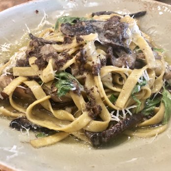 Industria Pizzeria + Bar - Tagliatelle with wild mushroom , truffle oil and arugula. - Pizza Near Me - Laval, Quebec Industria Pizzeria + Bar - Tagliatelle with wild mushroom , truffle oil and arugula. - Pizza Near Me - Laval, Quebec