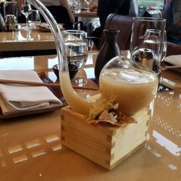 Miso soup served in a unique glass pipe dish
