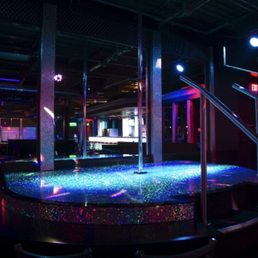 a circular pool in a nightclub