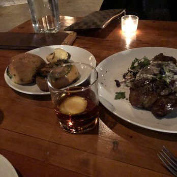 Grey Ghost - New York Strip with a side of bread and a bourbon cocktail - American Near Me - Detroit, Michigan