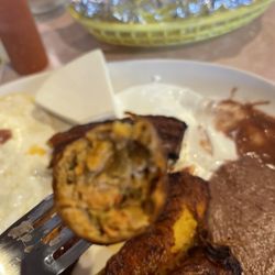 Berta's Salvadoran Kitchen - Chorizo, delicious. Crema w/a bean sauce and a wedge of El Salvadorian cheese. Dos Huevos sunny side up. Perfection!!!