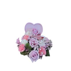 Lucille Florist - The heart box makes heart beats! Lots of pinks.