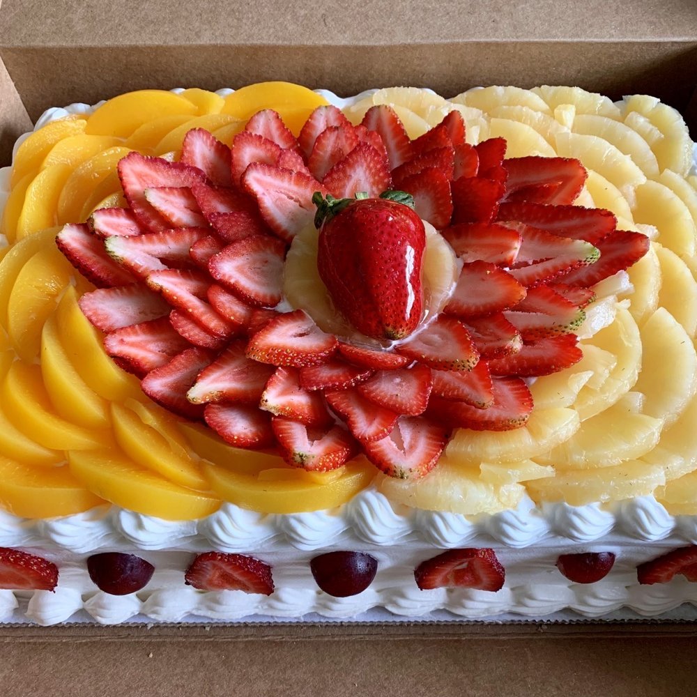 Oaxaca Bakery - a cake with strawberries, peaches, and pineapples - Bakeries Near Me - Canby, Oregon