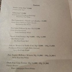 Menu....which the waiter did not offer any descriptions or recommendations....although he did for the other tables around me!