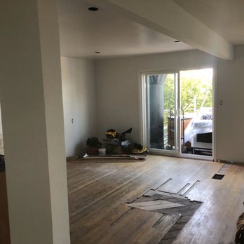 Best Value Home Improvements - Before floors were to be sanded after wall removal and ceiling had been repaired - Roofing Near Me - San Francisco, California Best Value Home Improvements - Before floors were to be sanded after wall removal and ceiling had been repaired - Roofing Near Me - San Francisco, California