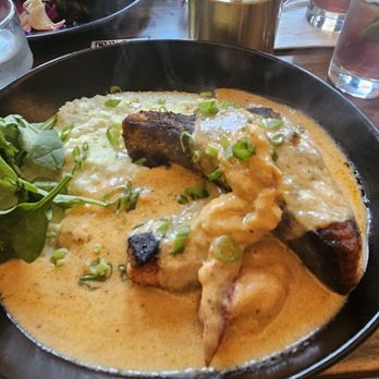 Yeiboh Kitchen - Salmon and grits sooooo good! Sauce was bomb - New American Near Me - Baltimore, Maryland