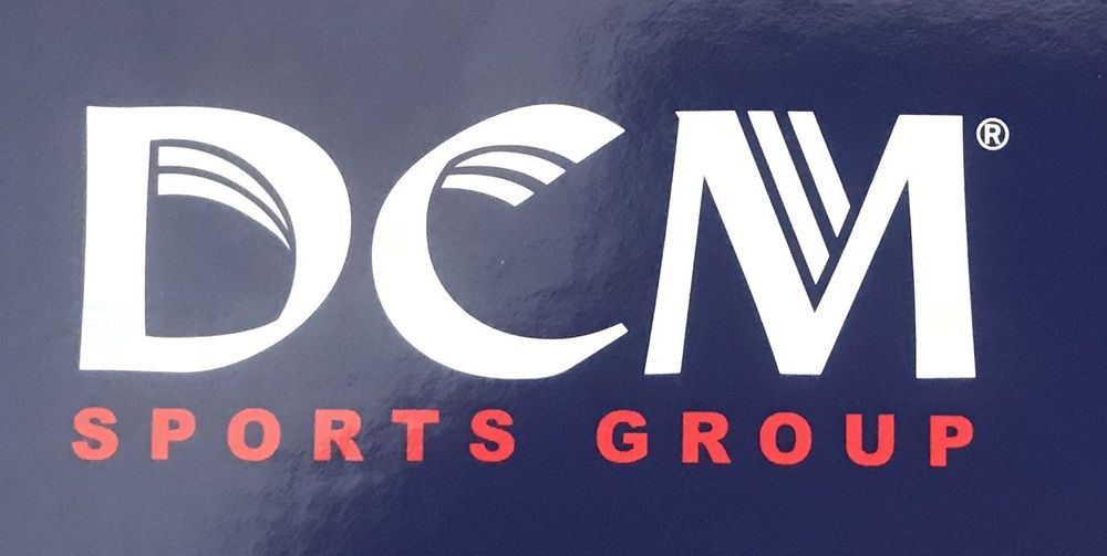 DCM SPORTS GROUP Logo