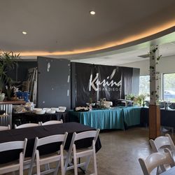 Kusina San Diego - Notice the ubiquitous folded tables right behind the plates/utensils area
