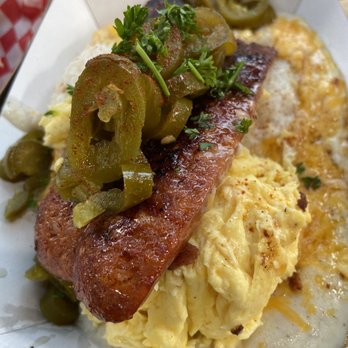 Biscuit Bitch - Hot Mess Biscuit: biscuit covered in grits, cheese, scrambled egg, hot link and jalapeños! - Breakfast & Brunch Near Me - Seattle, Washington Biscuit Bitch - Hot Mess Biscuit: biscuit covered in grits, cheese, scrambled egg, hot link and jalapeños! - Breakfast & Brunch Near Me - Seattle, Washington