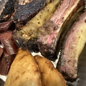 Kafi BBQ - The Tray: Briskets? Ribs, Sausage and Empanada - Barbeque Near Me - Irving, Texas
