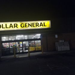Dollar General - Front of the Dollar General Store with a clean parking lot and no overflowing trash cans.