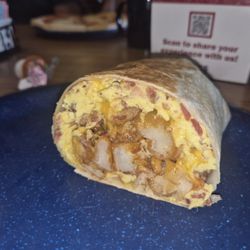 Breakfast burrito (put the potatoes INSIDE). Big enough to share