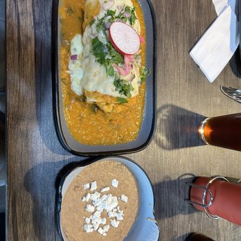 La Chingona - Wet burrito and side of refried beans. Very good - Mexican Near Me - Seattle, Washington