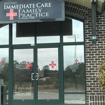 Med First Primary & Urgent Care - Posted hours and Neon OPEN sign. - Family Practice Near Me - Sneads Ferry, North Carolina Med First Primary & Urgent Care - Posted hours and Neon OPEN sign. - Family Practice Near Me - Sneads Ferry, North Carolina