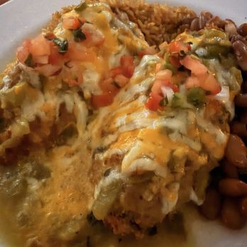 The Original Blue Adobe Grille - Spooning rellenos - Mexican Near Me - Mesa, Arizona The Original Blue Adobe Grille - Spooning rellenos - Mexican Near Me - Mesa, Arizona