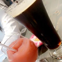 a person holding a drink