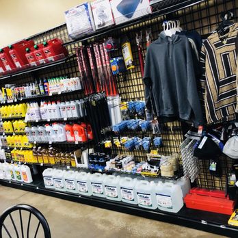 Parachute Shell - a display of sports equipment in a store - Convenience Stores Near Me - Parachute, Colorado