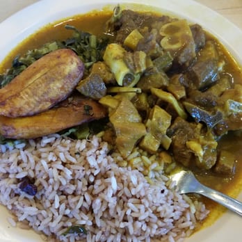 Caribbean Hut - Small curry goat, collards, rice and beans, plantains. No substitute. $11. Spicy and delish - Caribbean Near Me - Charlotte, North Carolina