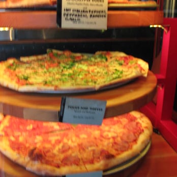 Sizzle Pie - Their pizzas have stupid names.  "Great Balls of Fire" has to be the worst.  Also, the selection of traditional pizzas is slim. - Pizza Near Me - Portland, Oregon