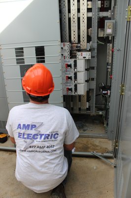 AMP Electric Logo