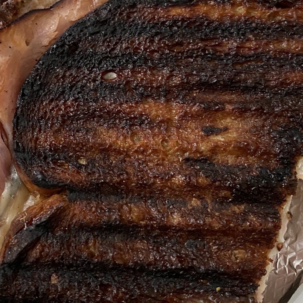 Burnt Monte Cristo. No, it's not just the way it looks. It looks burnt, it smells burnt and it tastes BURNT.
